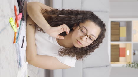 Vertical-video-of-Female-student-with-Neck-Pain.